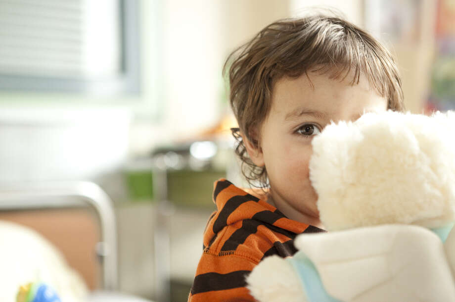 A person of its own Boy hugging a teddy bear
